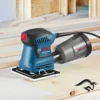0601.2A2.1E0-000-4.webp Lijadora Orbital (115 x 140 mm) 180W Bosch GSS 140-1A 0601.2A2.1E0-000
