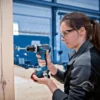 0615.A00.260-000-5.webp Amoladora 5" 2 Bat GWS 180-LI + Taladro Percutor 1/2" 18V Brushless GSB 18V-90 C Bosch 0615.A00.260-000