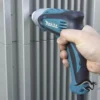 TD0100-2.webp Atornillador de Impacto 1/4" Hex 230W 100 Nm Makita TD0100
